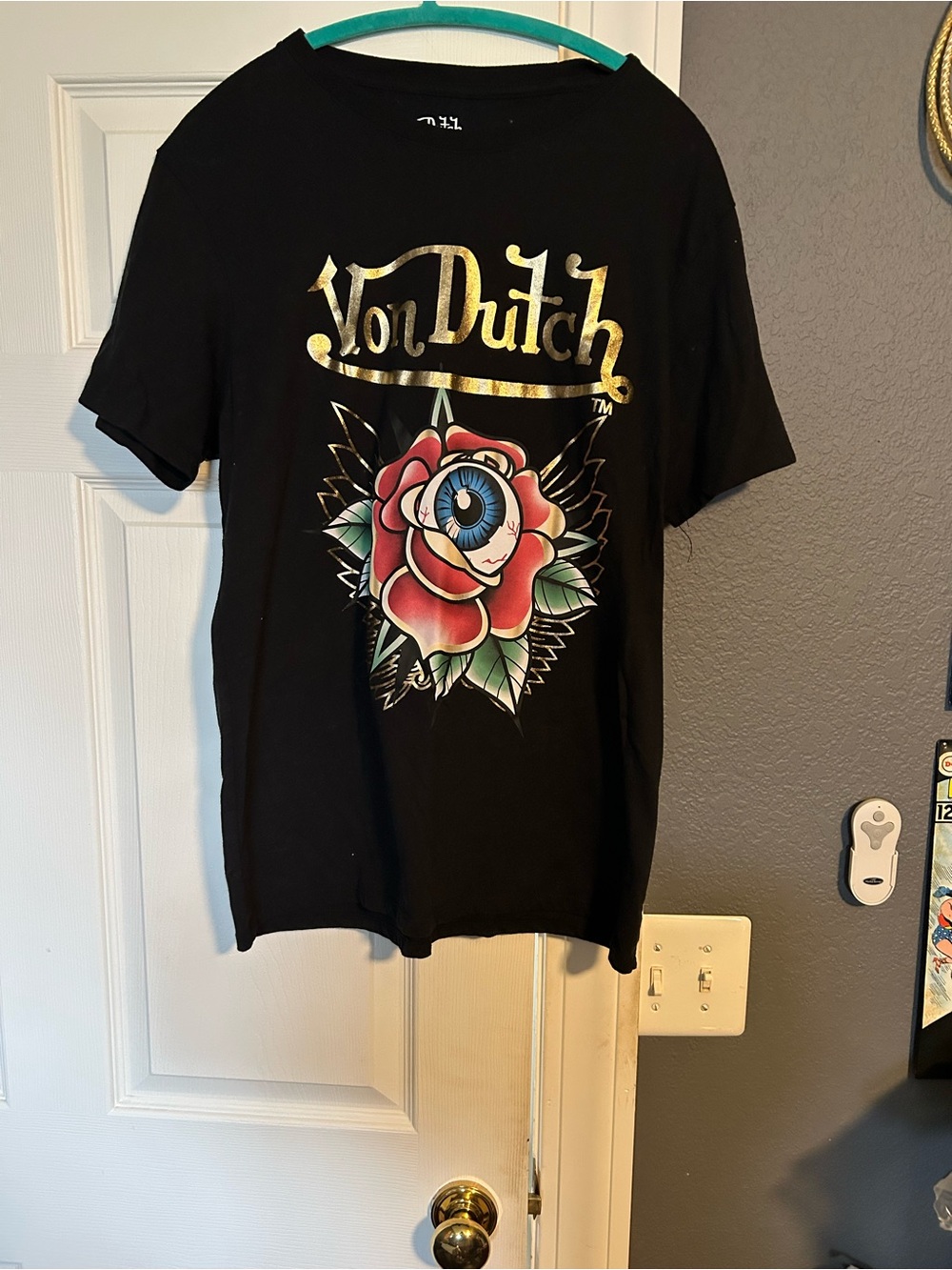 Von Dutch Black Short Sleeve Tee with Gold Logo and Red Rose Eye Graphic